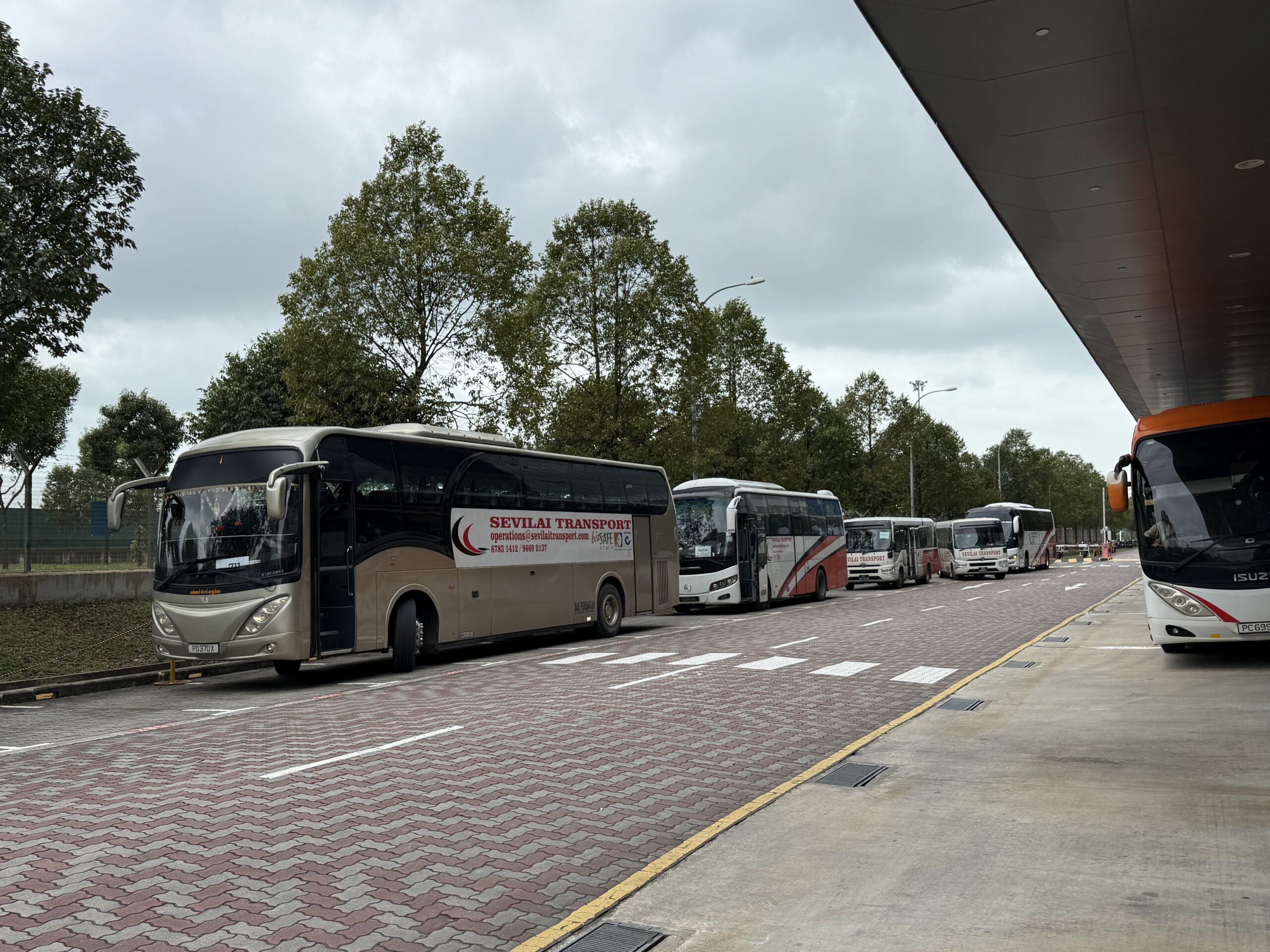 Sevilai Transport team and fleet representing the company’s journey and growth in group travel services.